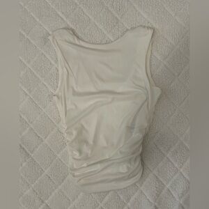 Zara Top with a V shaped back
Never Worn 
Size S